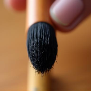 An exquisite handmade Kumano calligraphy brush with a bamboo handle.